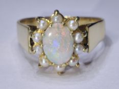 A Stunning 18ct Gold Australian White Crystal Opal and Pearl ring – 6.03g - Size R.5.