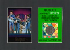 The Beatles First Single Release Coin Gift Set. Love Me Do on the 5th October 1962.