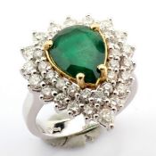 18K White Gold Cluster Ring Detailed With Vibrant Emerald and Pear and Brilliant Diamonds