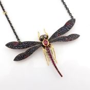 An Exquisite Necklace Intricately Detailed With Ruby, Sapphire, Brilliant Diamonds and Gold On Si...