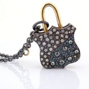 An Exquisite, Convertible Clasp Necklace Embellished With Gold and Diamonds On Silver