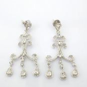 18K White Gold Earrings Detailed With Brilliant Diamonds