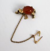 Gold Rhino Form Brooch With Carnelian & Ruby Eyes