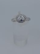 Silver Stamped 925 Dress Ring Set With CZ Stone, Centres Tone Measures 5.94 mm Diameter. Finger S...