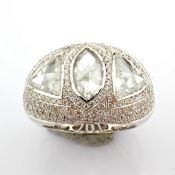 A Luxurious 18K White Gold Ring Detailed With A Slightly Flawed Fancy Cut Diamonds. Total 5.06 Ca...