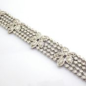An Exquisite 18K White Gold Bracelet Detailed With Different Cut Diamonds