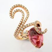 An Exquisite 18K Ring Detailed With 8Ct 'Cab' Tourmaline and 1.23 Ct Diamonds.