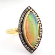 18K Ring Detailed With Opal and Brilliant Diamonds On A Silver Frame