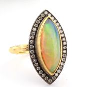 18K Ring Detailed With Opal and Brilliant Diamonds On A Silver Frame