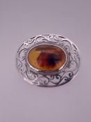 Silver Broach Set with Oval Cabochon Natural Amber
