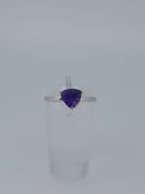 Silver Rind Set with Trillion Cut AAA Amethyst Stone