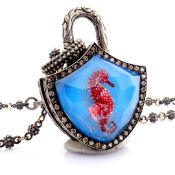 Clasp necklace with gold, topaz and reversely engraved intaglio seahorse and diamonds on silver