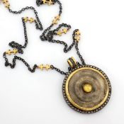 Necklace made of gold and silver with antique watch dial with precious colourful stones and diamond.