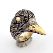 18K bird ring detailed with brilliant diamonds on silver