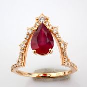 18K rose gold ring. Detailed with Ruby and brilliant diamonds.