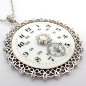 An exquisite necklace made of gold and silver, featuring an antique watch dial with diamonds