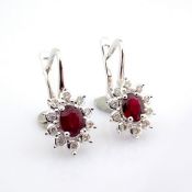 An exquisite cluster earrings made of ruby, brilliant diamonds and gold