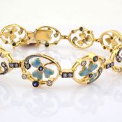 18K yellow gold bracelet detailed with emerald, sapphire and brilliant diamonds