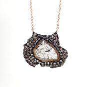 18K yellow gold necklace with slice cut rough diamond and brilliant diamonds on silver frame