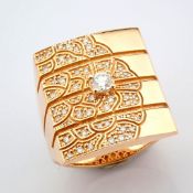 An exquisite 14k ring detailed with brilliant diamonds