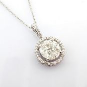 18K white gold necklace detailed with baguette and brilliant diamonds