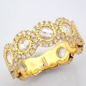 18K yellow gold ring detailed with fancy cut and brilliant diamonds.