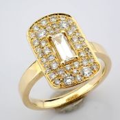 14K gold ring , with round and baguette cut diamonds