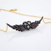 18k wing necklace detailed with brilliant diamonds