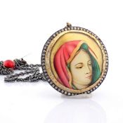 An exquisite necklace detailed with micro-art , brilliant diamonds and gold on silver