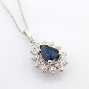 18K white gold cluster necklace detailed with sapphire and brilliant diamonds
