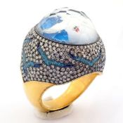 Hand-made gold & silver ring. Detailed with topaz with reversely engraved intaglio bird and diamond.