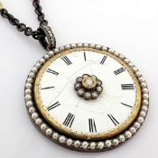 An exquisite necklace made of gold and silver, featuring an antique watch dial adorned with diamond.