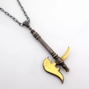 Sword necklace detailed with brilliant diamonds and 24K gold on silver.