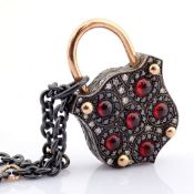 Convertible clasp necklace embellished with gold, colourful stones, and diamonds on silver