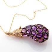An exquisite aubergine necklace detailed with amethyst and brilliant diamonds