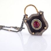 Convertible clasp necklace with gold, vibrant tourmaline, ebony-carved and diamonds on silver