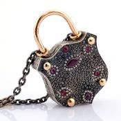 Convertible clasp necklace embellished with gold, colourful stones, and diamonds on silver