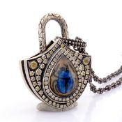 Clasp necklace with gold and topaz with reversely engraved intaglio beetle and diamonds on silver