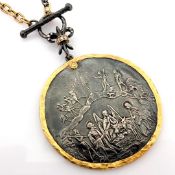 Mythological scene intricately engraved in silver, adorned with gold accents and sparkling Diamond..