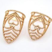 18K rose gold double ring detailed with brilliant diamonds