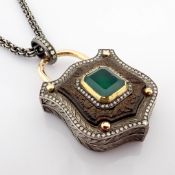 Convertible clasp necklace embellished with gold, emerald, ebony-carved and diamonds on silver