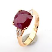 18K rose gold ring detailed with ruby glass and brilliant diamonds