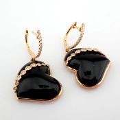 18K rose gold earrings detailed with onyx and brilliant diamonds and gold