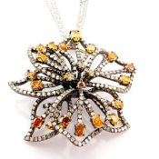 18K white gold necklace detailed with brilliant diamonds and black rhodium on it