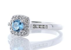 9ct White Gold Blue Topaz Diamond Halo Ring