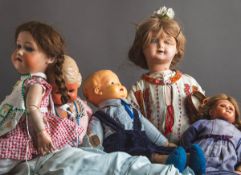 12-teiliges Konvolut von Puppen (19. u. 20. Jh.)