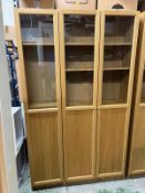 A double and single glazed bookcase/display unit
