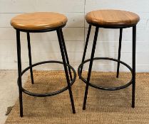 A pair of industrial style bar stools with wooden seats (H66cm)