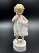 A small Royal Worcester figurine a young girl titles 