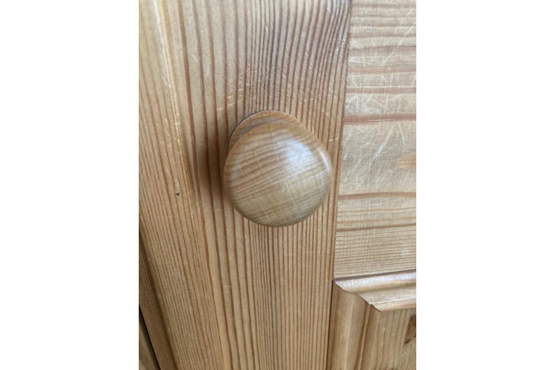 A pine wardrobe comprising of central mirrored door flanked by two panel doors with three drawers - Image 6 of 6